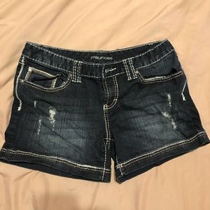 Dark, distressed jean shorts size 9/10
